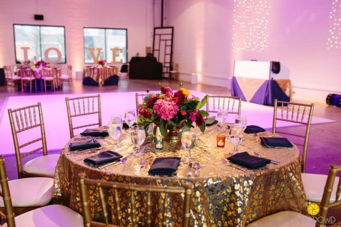 Gold and fuchsia wedding decor table